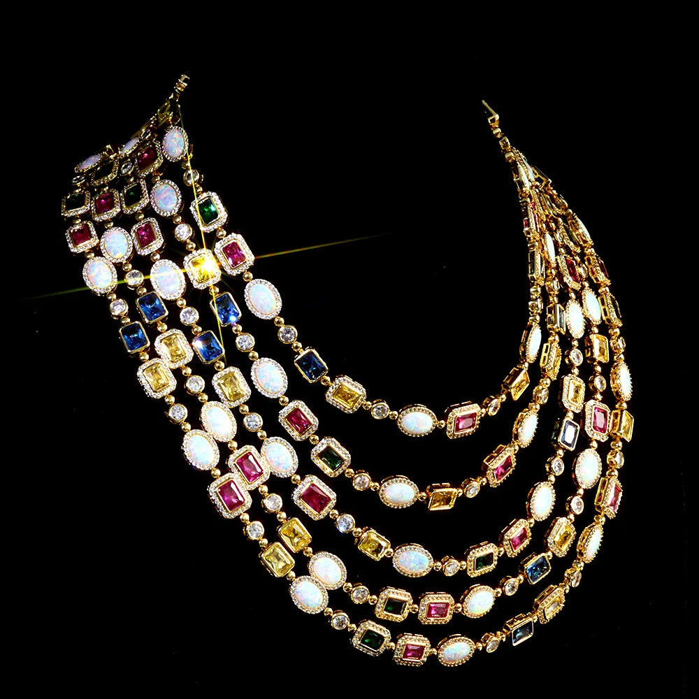 MIMOTTA CIPHER in gold tone with opal-effect and colour stones