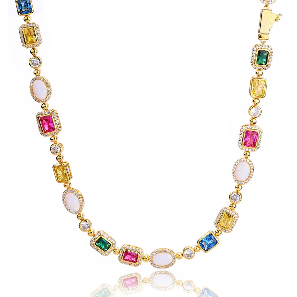 MIMOTTA CIPHER at necklace length in gold tone on white background
