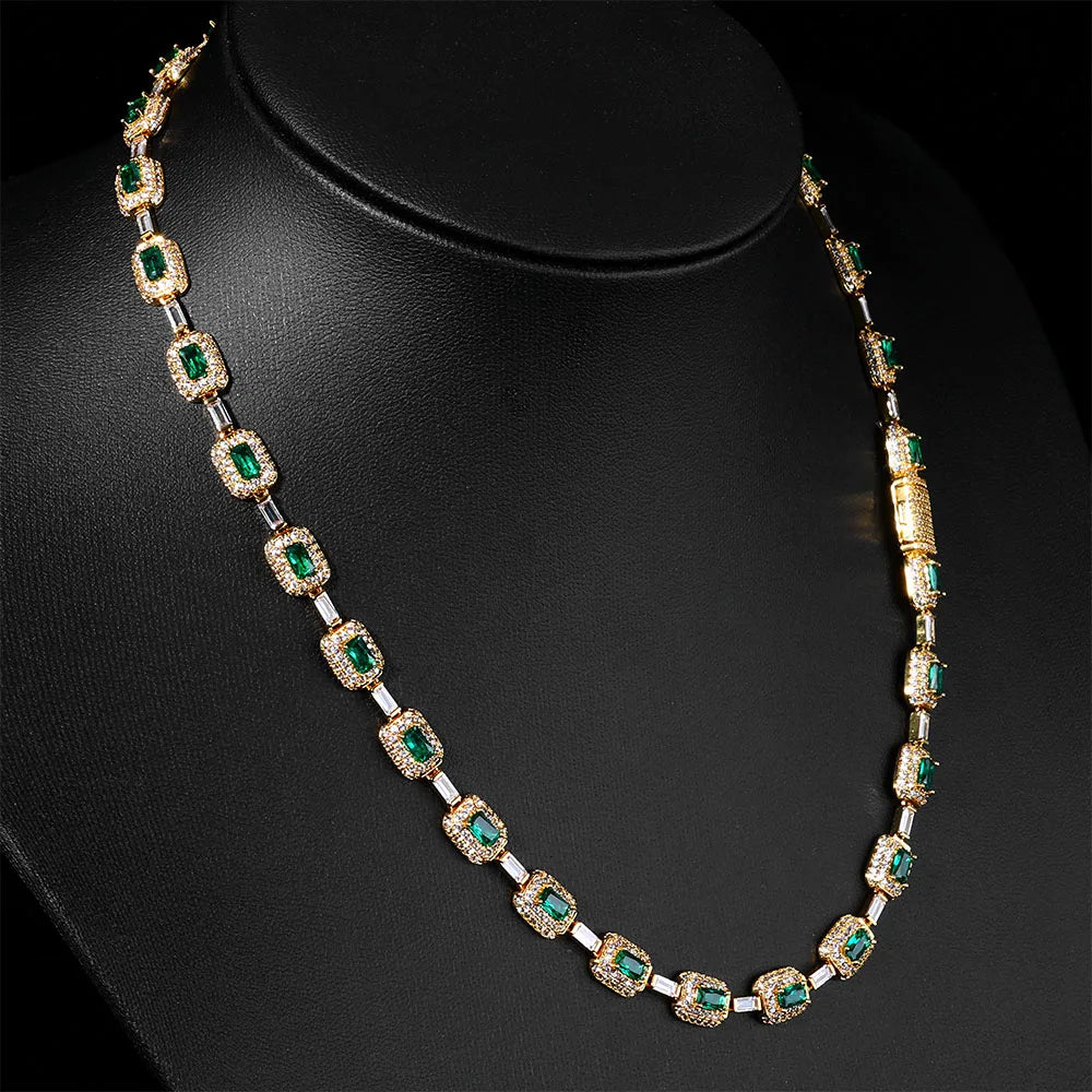 MIMOTTA VAULT design in gold tone shown at necklace length on a black bust