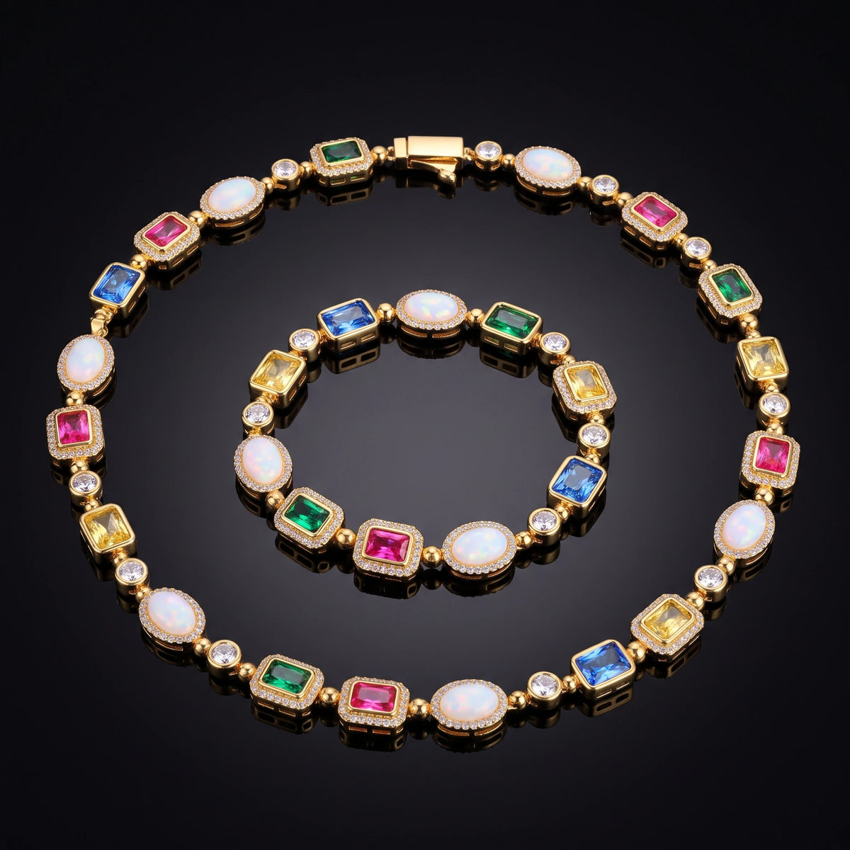 MIMOTTA CIPHER bracelet and necklace set on a black mirror