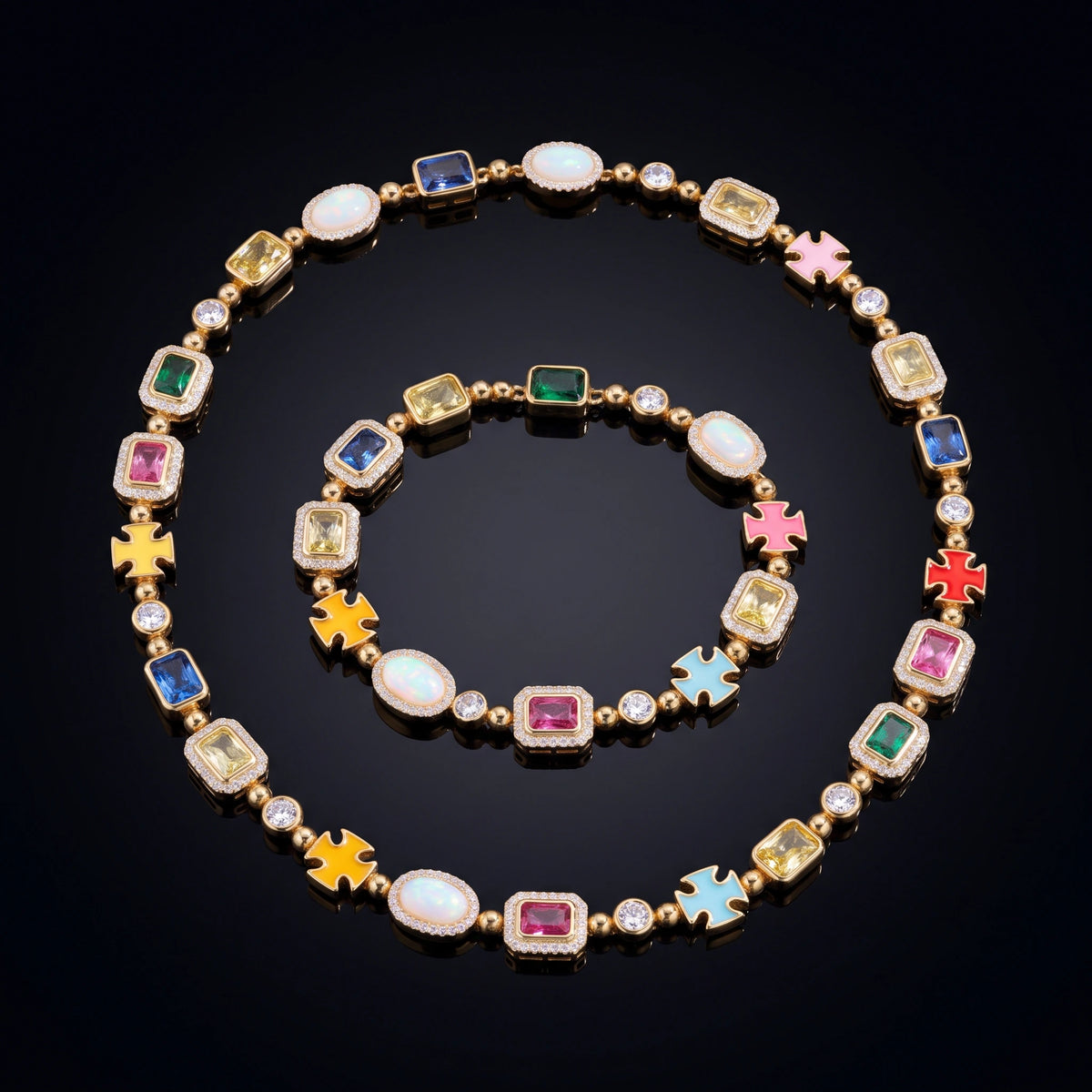 MIMOTTA CREED bracelet and necklace set on a black mirror