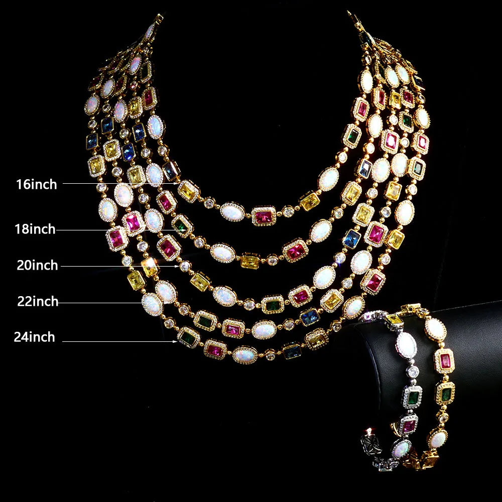 MIMOTTA CIPHER design layered in 16 to 24 inch necklace lengths on a black display