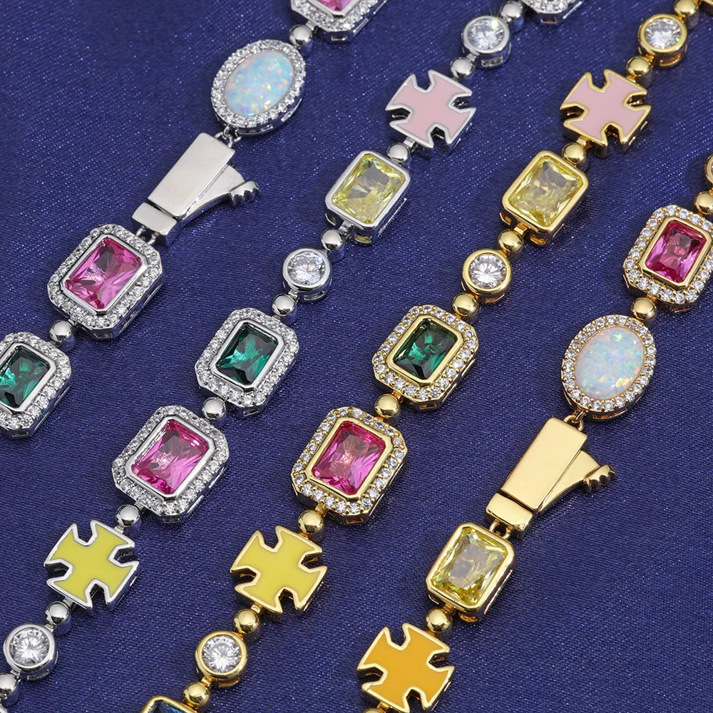 MIMOTTA CREED close-up of cross motifs and halo stones