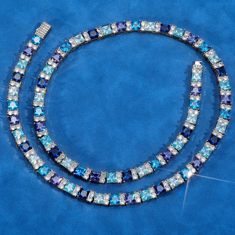 MIMOTTA ZENITH blue gradient design shown at necklace length on blue velvet