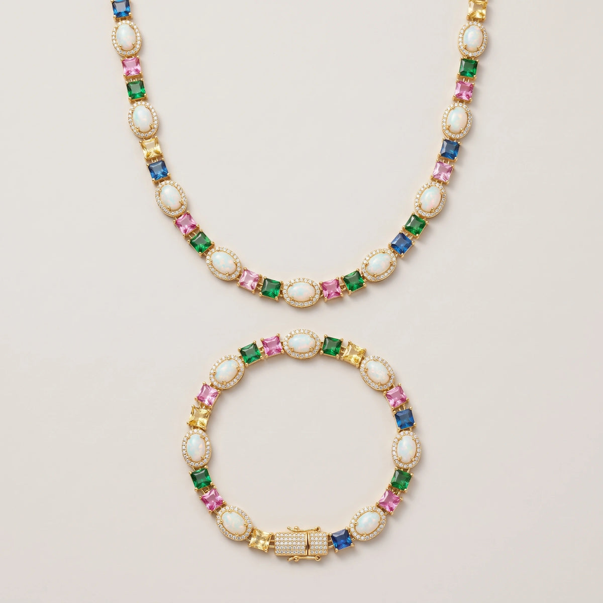 MIMOTTA CIPHER tennis bracelet in gold tone with matching necklace