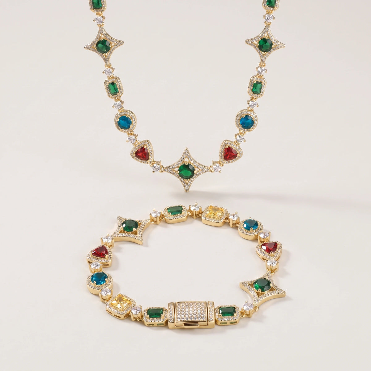MIMOTTA PARADOX gemstone bracelet in gold tone with matching necklace